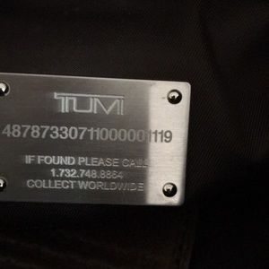 Tumi brown backpack